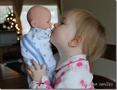 Lily loving her baby doll