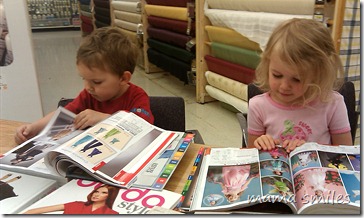 Reading pattern books at the fabric store