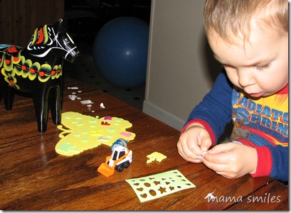Johnny decorates with foam stickers