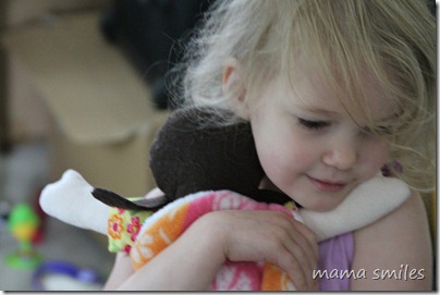 loving her owie doll