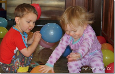 Lily chasing balloons