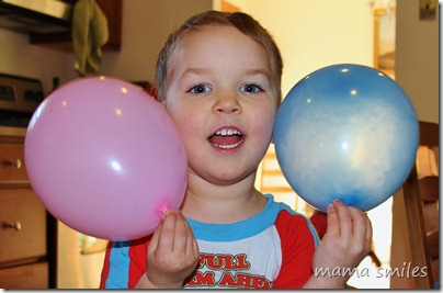 Johnny goofing around with balloons