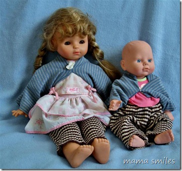 Emma's dolls dressed in tops and pants made from old sweaters