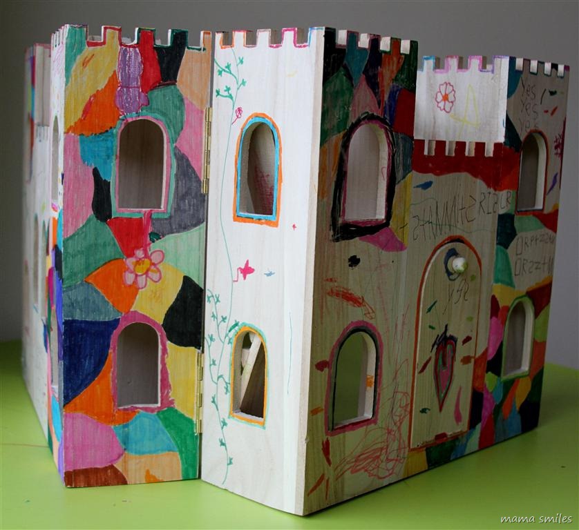 child-decorated wooden castle