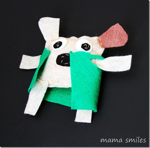 child-sewn stuffed dog with clothes