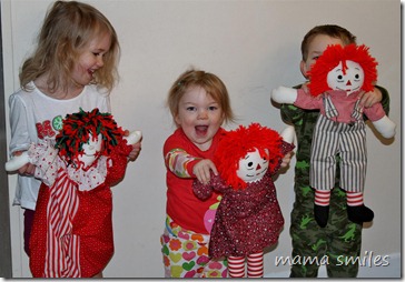 Emma, Lily, and Johnny with dolls made by their great-grandmother