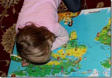 Emma explores the world via the LeapFrog Tag Interactive World Map