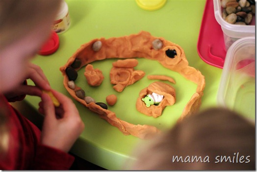 Using a small figurine to add a creative component to sensory play