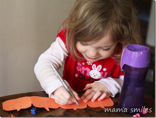 Halloween fun: Drawing faces on pumpkin chains