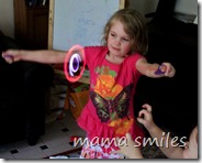 Emma experiments with a Fyrflyz toy