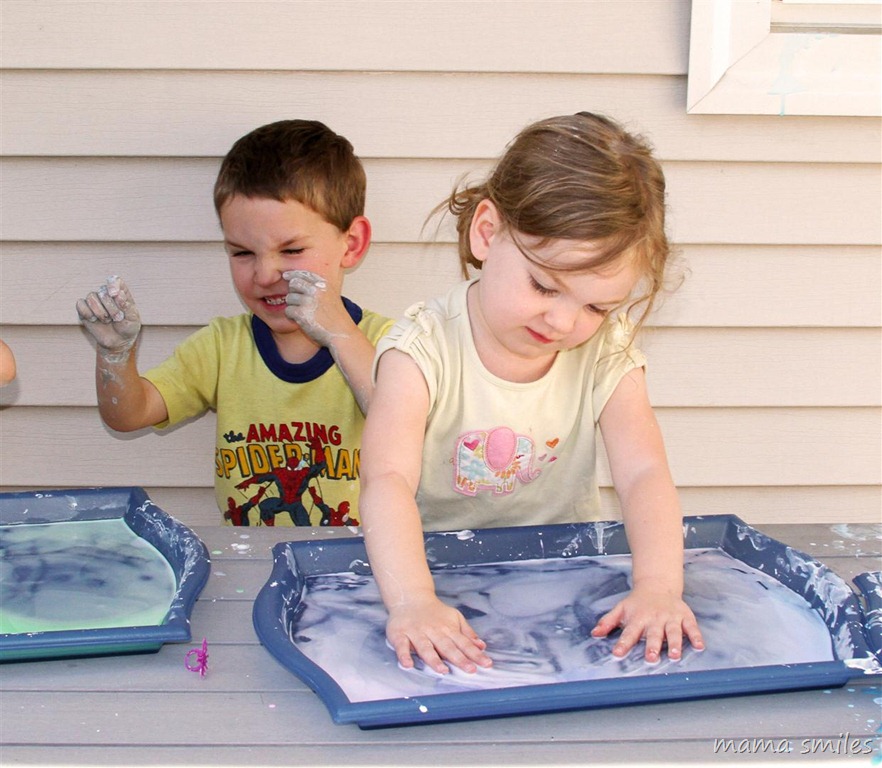 cautious sensory play with corn starch and water