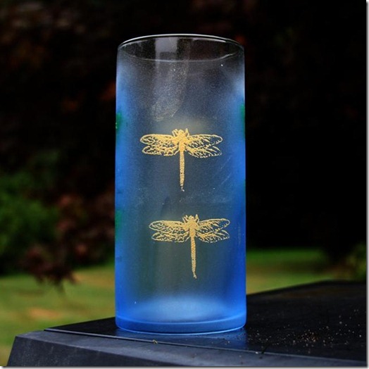 fireflies silkscreened on a vase