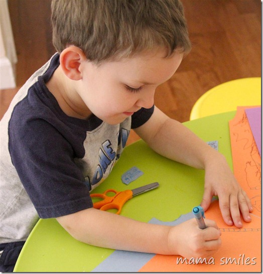 Four-year-old creating drawings