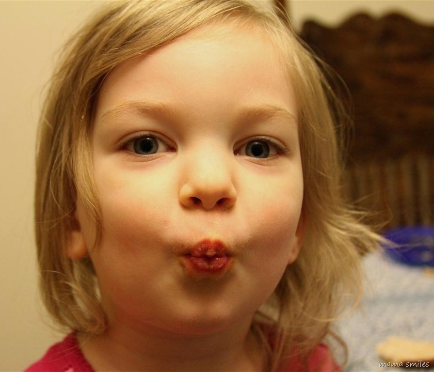 Lily practices making fishy lips