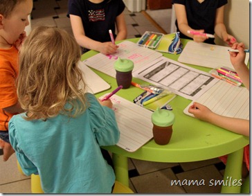 Drawing pictures and writing on their new white boards Drawing pictures and writing on their new white boards