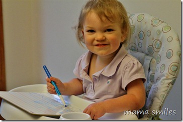 Lily enjoys drawing with white board markers Lily enjoys drawing with white board markers