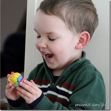 Johnny loves the novel texture of plasticine!