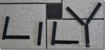 Lily's name spelled out in toys