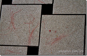 Johnny and Lily's crayon scrawls on the floor