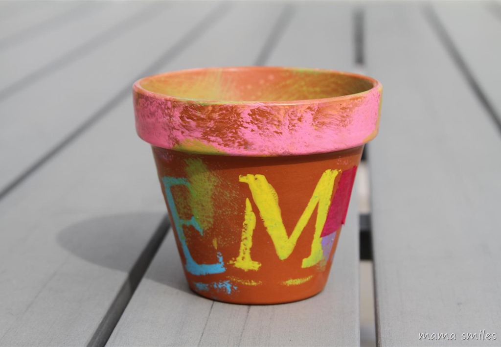 seven-year-old mod podged and stenciled pot - with tissue paper as well