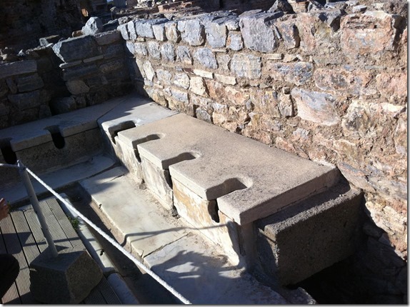ruins of an ancient public bathroom in Ephesus, Turkey