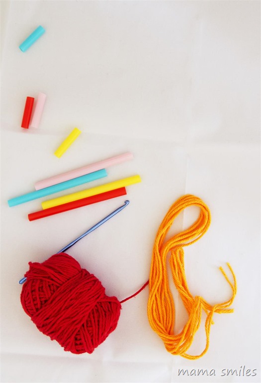 all you need for straw weaving is straws, scissors, and yarn. A crochet hook can be helpful, but it is not necessary.