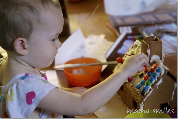 decorating a gingerbread house is great fine motor skill practice for kids