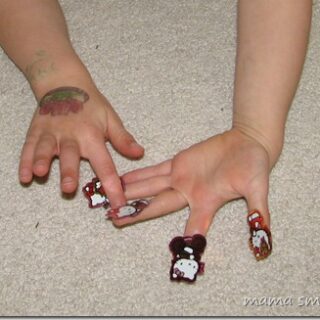 Stickers make wonderful instant finger puppets for kids.