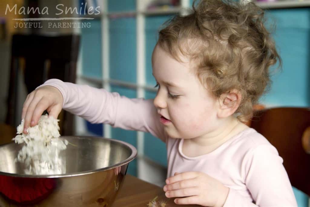 Spring blossoms make a wonderful sensory play experience for kids.