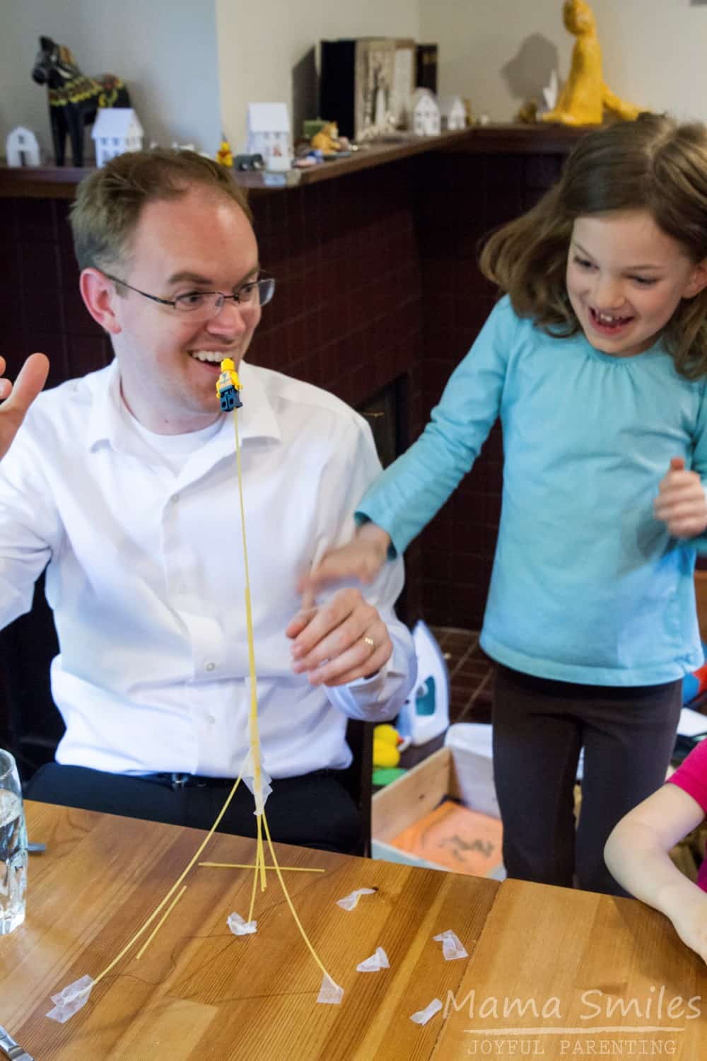 Build a spaghetti tower STEM challenge for kids.