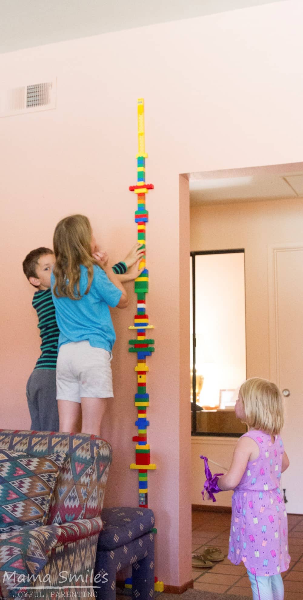 We build a tall tower out of DUPLO bricks at every birthday party we hold!
