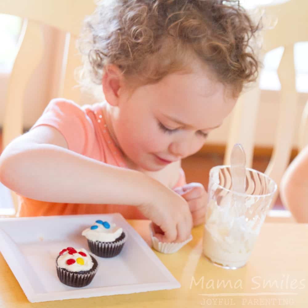 Decorating cupcakes is one of our all-time favorite birthday party activities