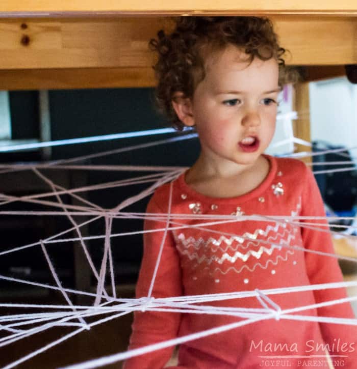 This spider web activity is a great gross motor challenge for kids and perfect for rainy day play!
