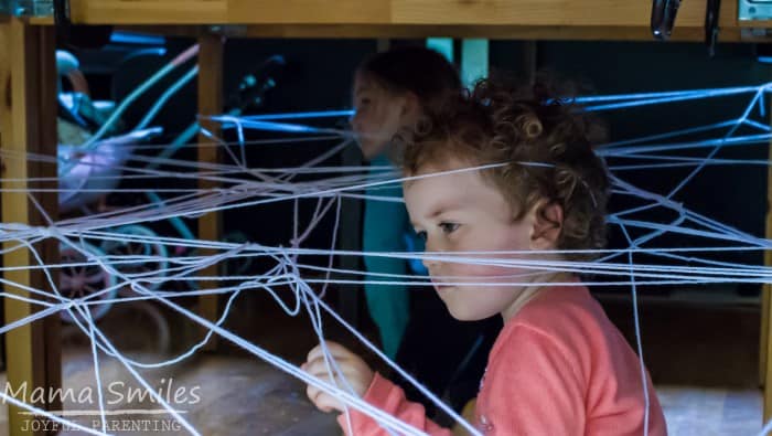 Having kids build and then navigate a spider web obstacle course makes an excellent gross motor activity.