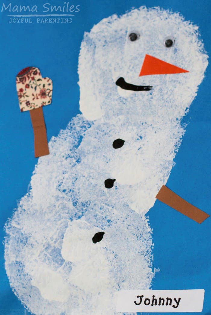 Sponge painted snowman winter craft for kids.