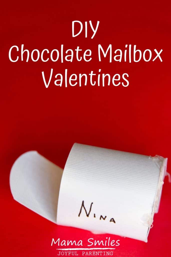 These mini mailbox valentines have a delicious chocolate center and are easy and fun to make! #valentinesdaycraft #vday #valentinesday
