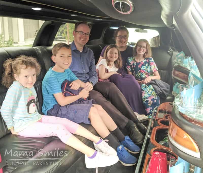 Family riding in a limo