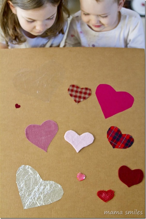 heart-themed sensory board for kids